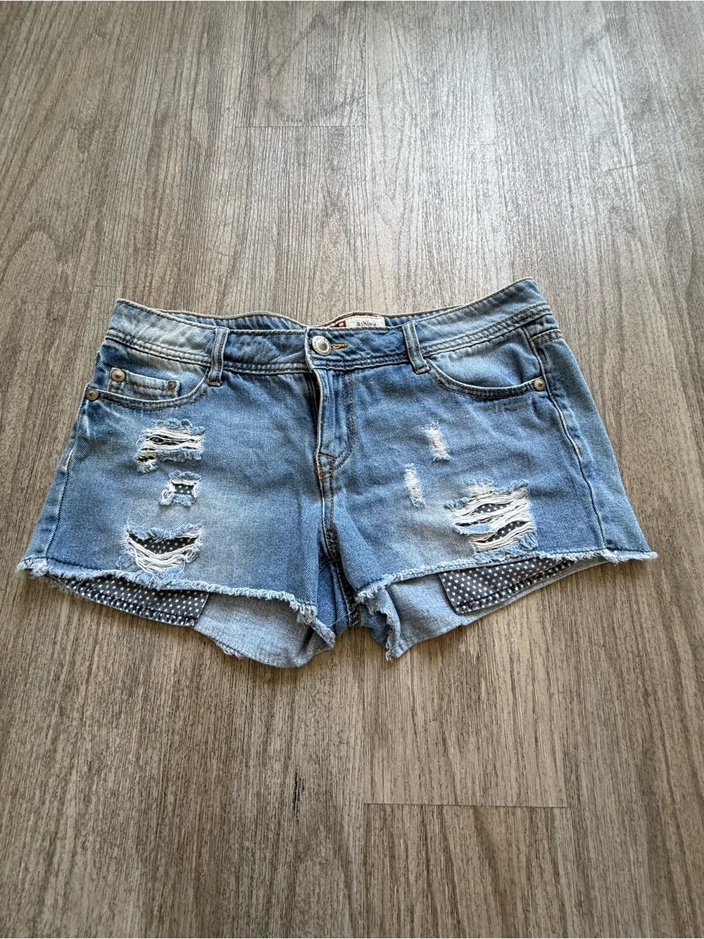 Vintage Lei Women’s Light Blue Distressed Denim Shorts